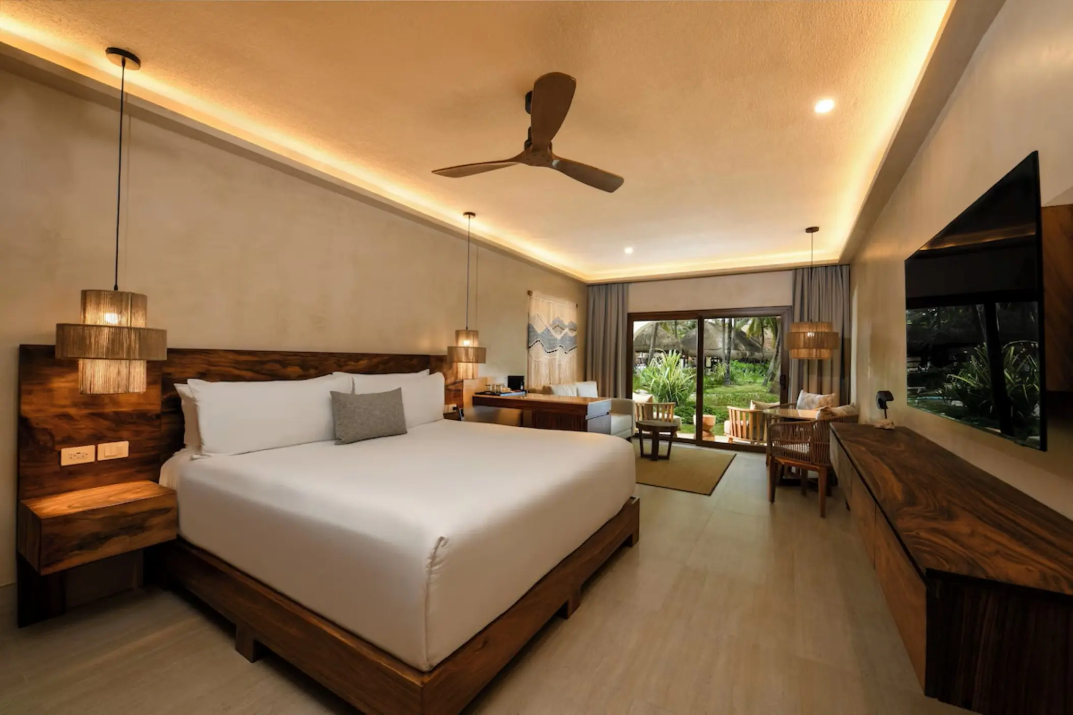 Modern suite with wood accents and a private terrace at El Dorado Royale, Riviera Maya
