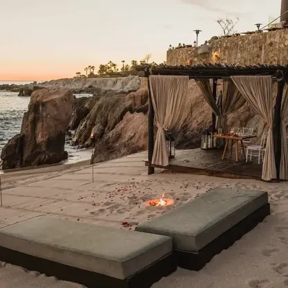 Private beach dinner cabana and daybeds at Esperanza, Cabo San Lucas