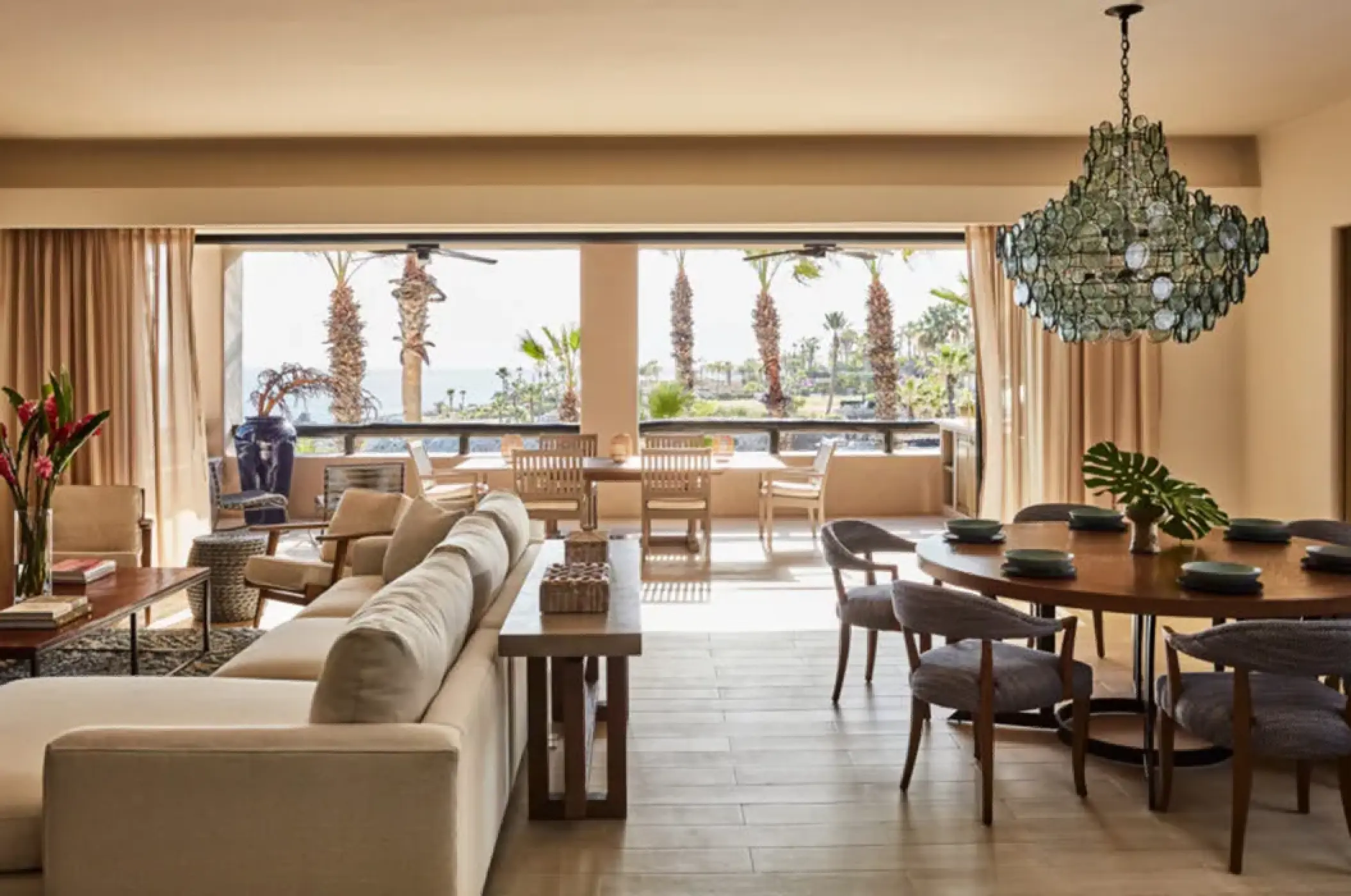 Living and dining area of a suite at Esperanza Cabo San Lucas
