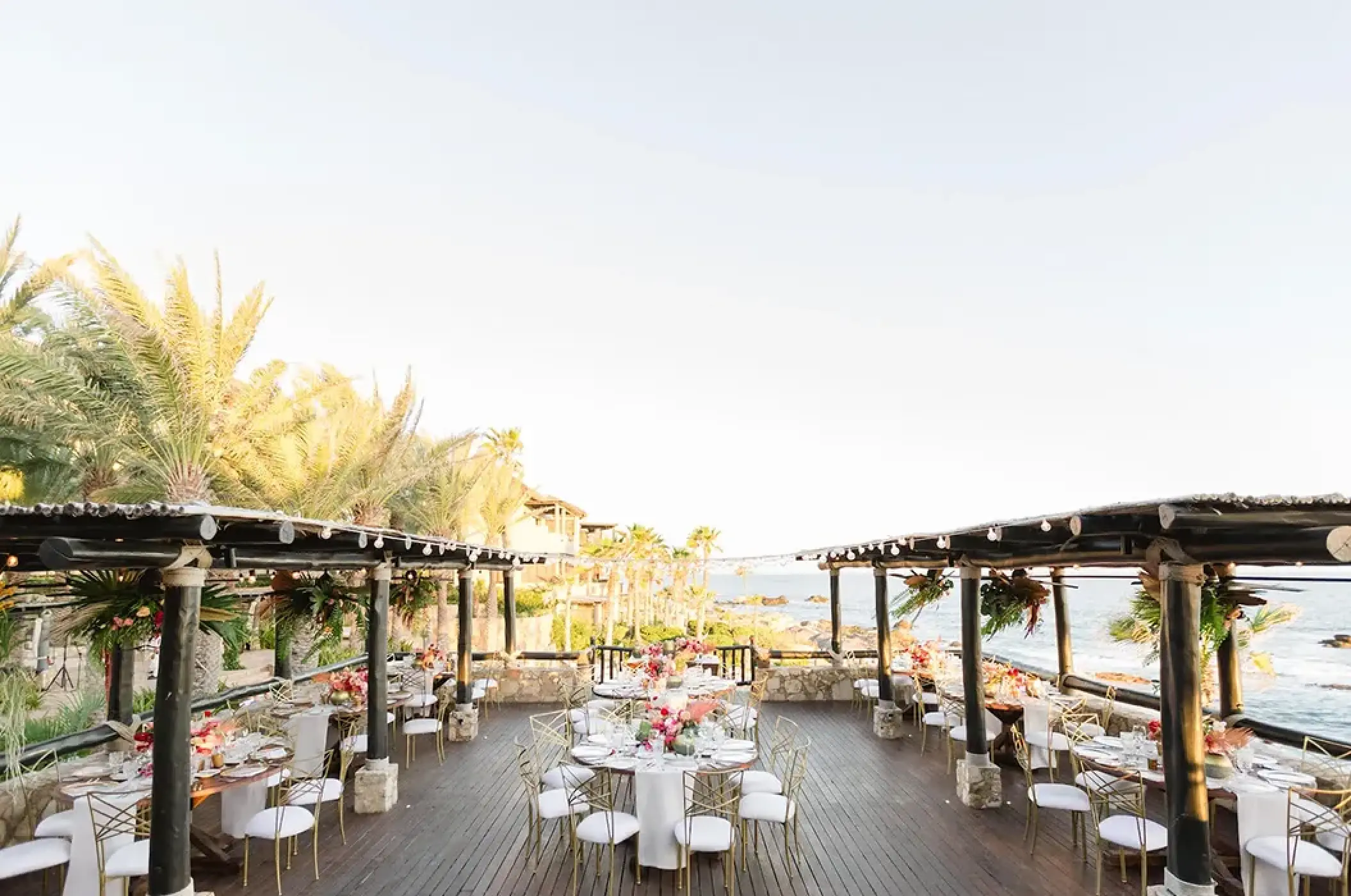 Outdoor terrace wedding reception with ocean views at Esperanza, Cabo San Lucas