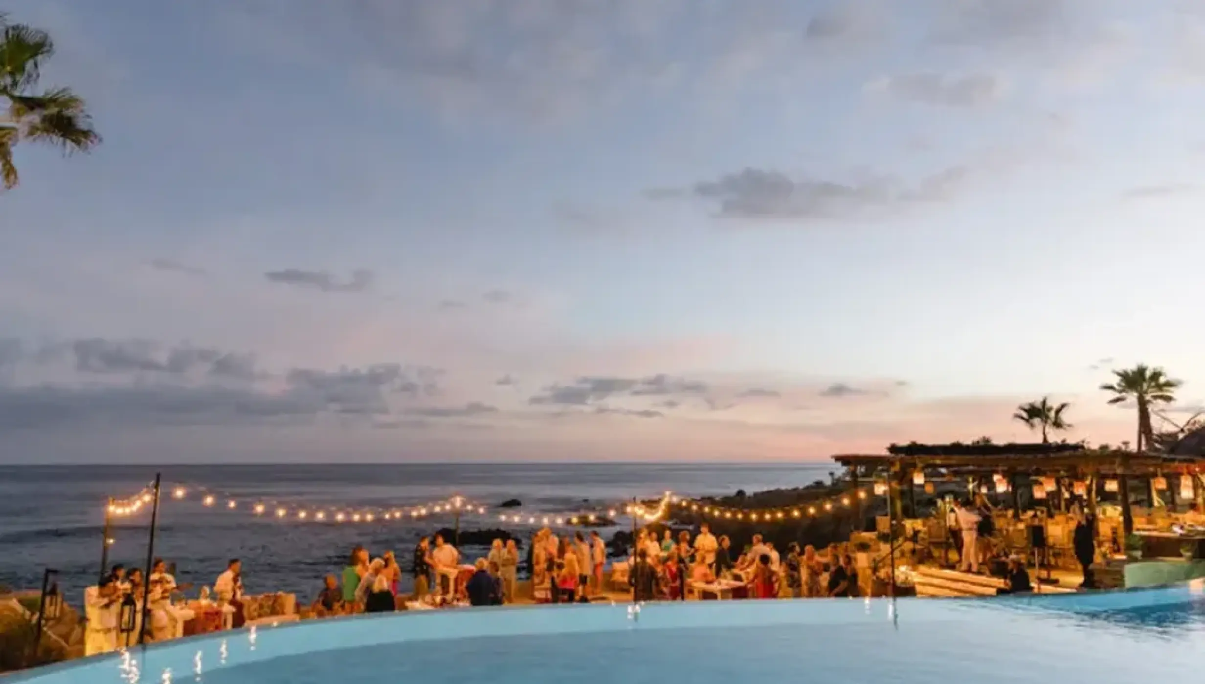 Outdoor wedding reception on the wooden deck at Esperanza, Cabo San Lucas