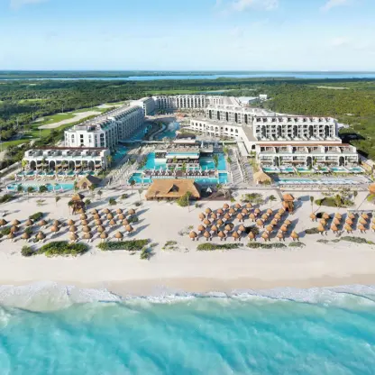 Aerial view of Excellence Coral Playa Mujeres beachfront and resort pools, Cancun