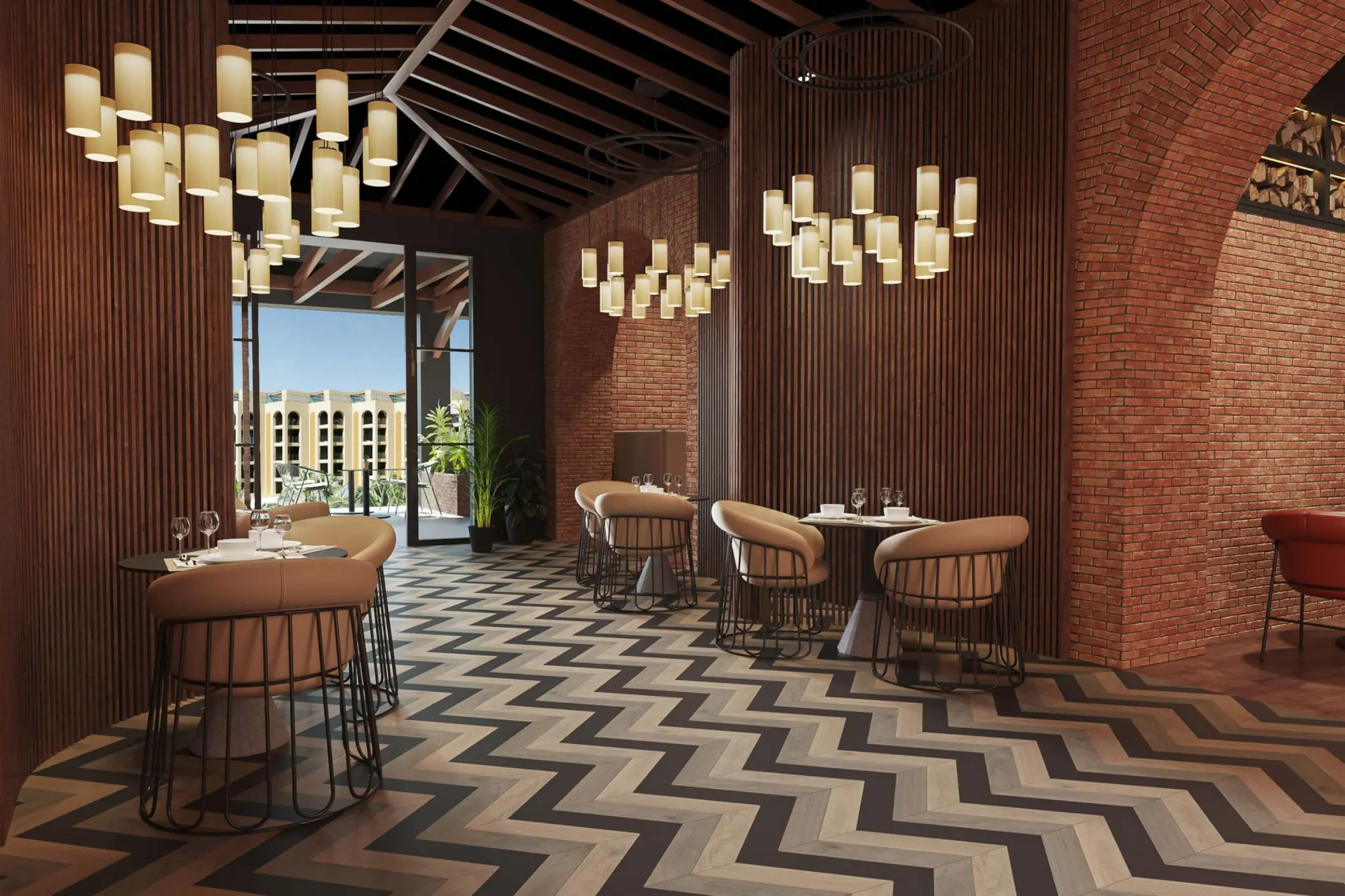Agave Restaurant interior with chevron flooring and brick accents at Excellence Coral Playa Mujeres, Cancun