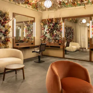 Bridal salon with floral wall art and vanity mirrors at Excellence Coral Playa Mujeres, Cancun