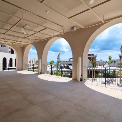 Ballroom terrace with stone arches and resort views at Excellence Coral Playa Mujeres, Cancun