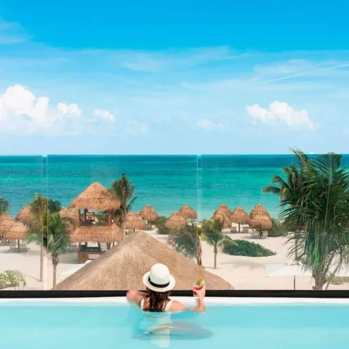pool overlooking the beach at Excellence Coral Playa Mujeres