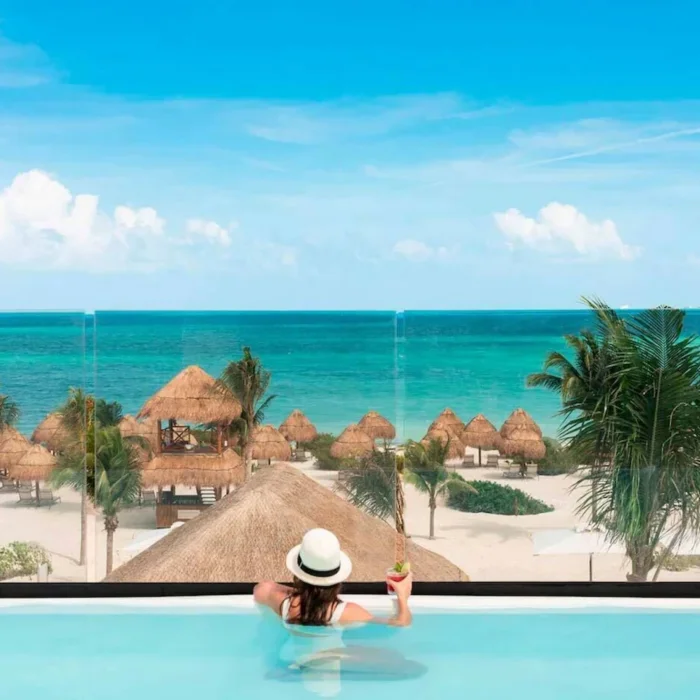 pool overlooking the beach at Excellence Coral Playa Mujeres