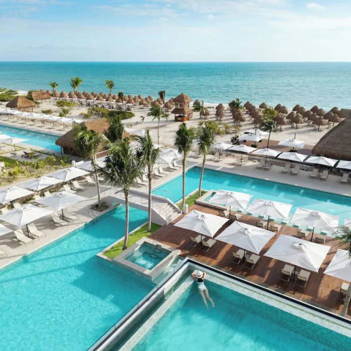aerial view of the pools and beach at Excellence Coral Playa Mujeres