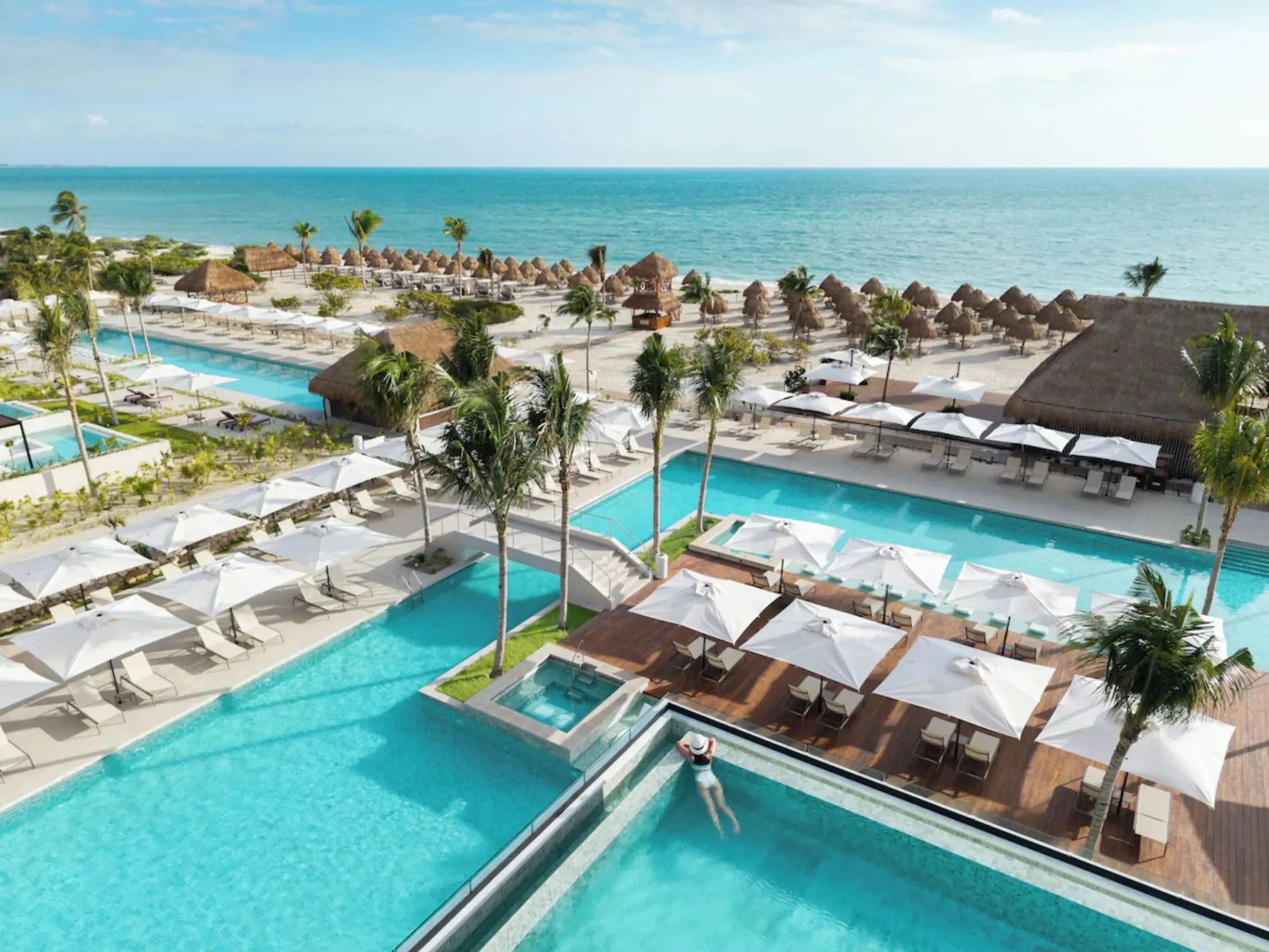 Aerial view of swimming pools and beach at Excellence Coral Playa Mujeres, Cancun
