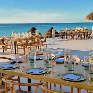Oceanfront wedding reception tables at Fiesta Americana Condesa, Cancun