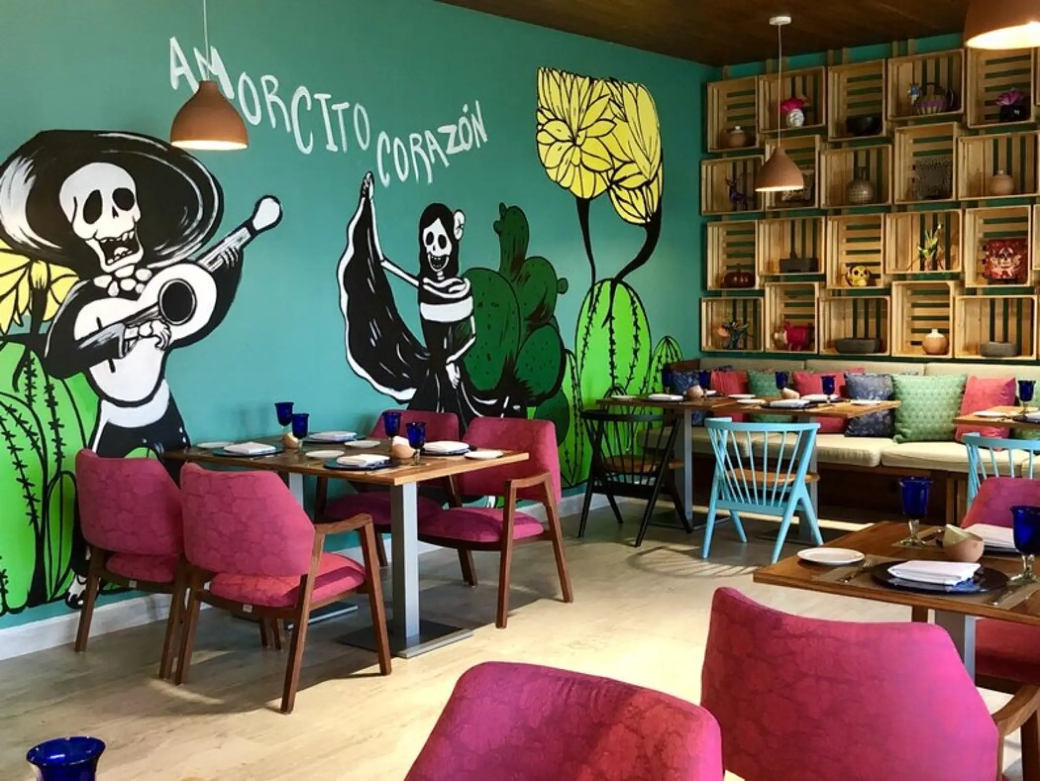 El Mexicano restaurant dining area with a skeleton mural at Fiesta Americana Condesa, Cancun