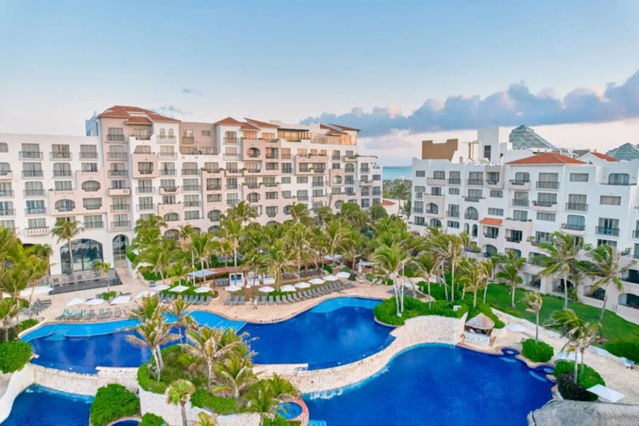 Fiesta Americana Condesa tiered outdoor pools and resort exterior, Cancun