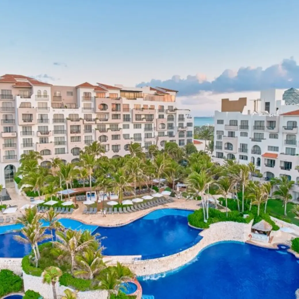 Fiesta Americana Condesa tiered outdoor pools and resort exterior, Cancun