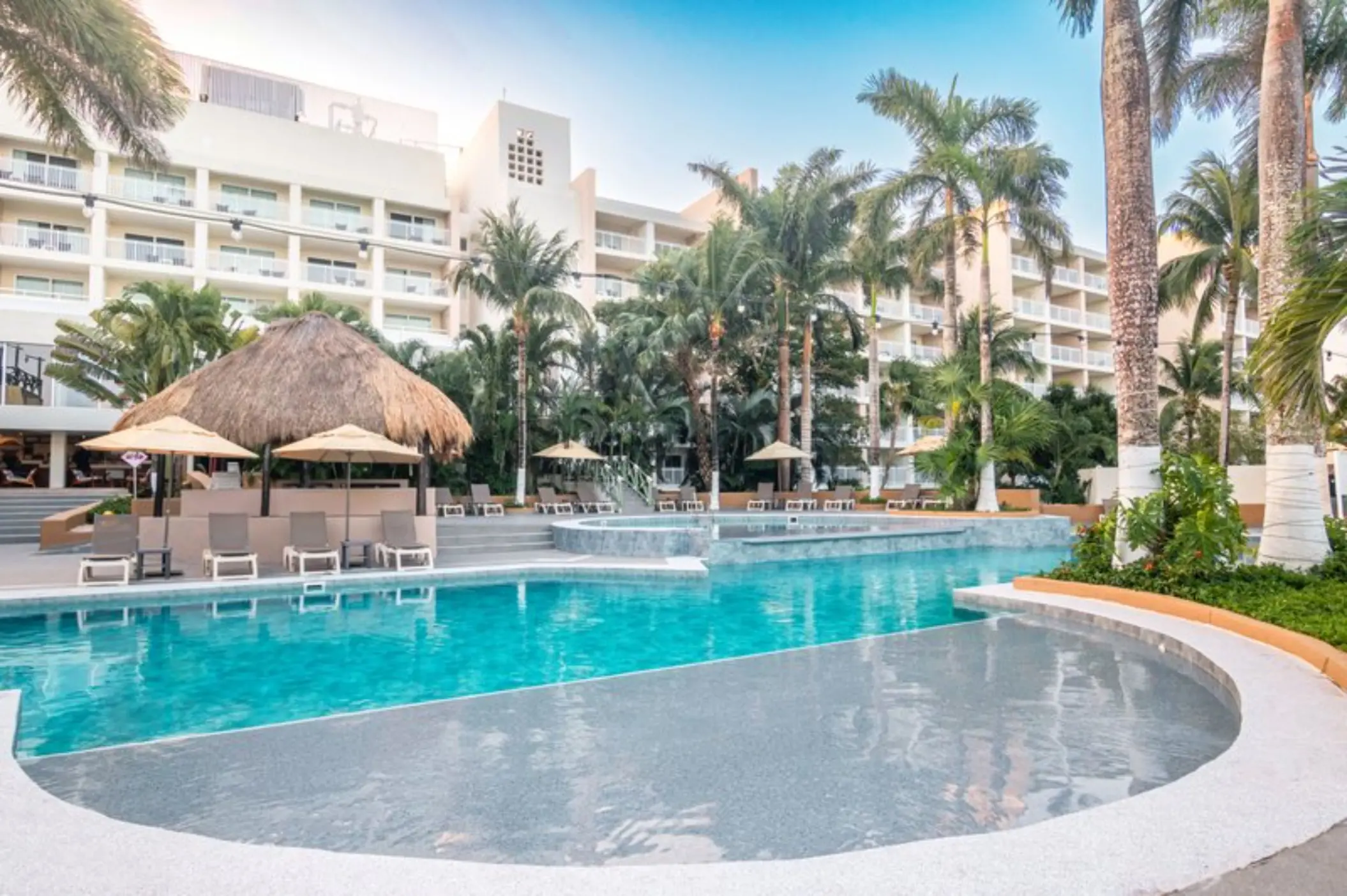 Fiesta Americana Cozumel main pool and poolside lounge chairs, Cozumel