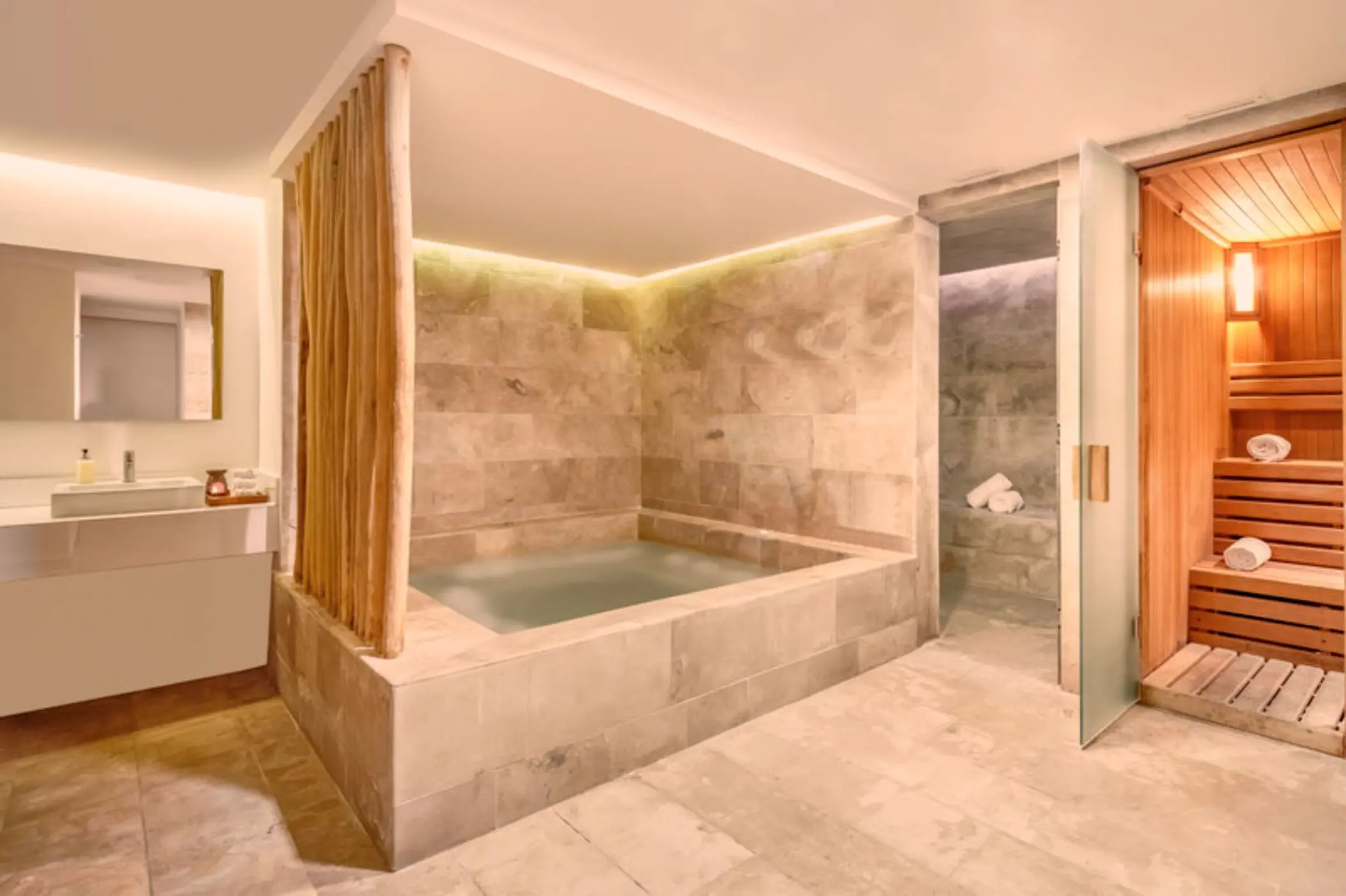 Indoor hot tub, steam room and wooden sauna at the spa in Fiesta Americana Cozumel