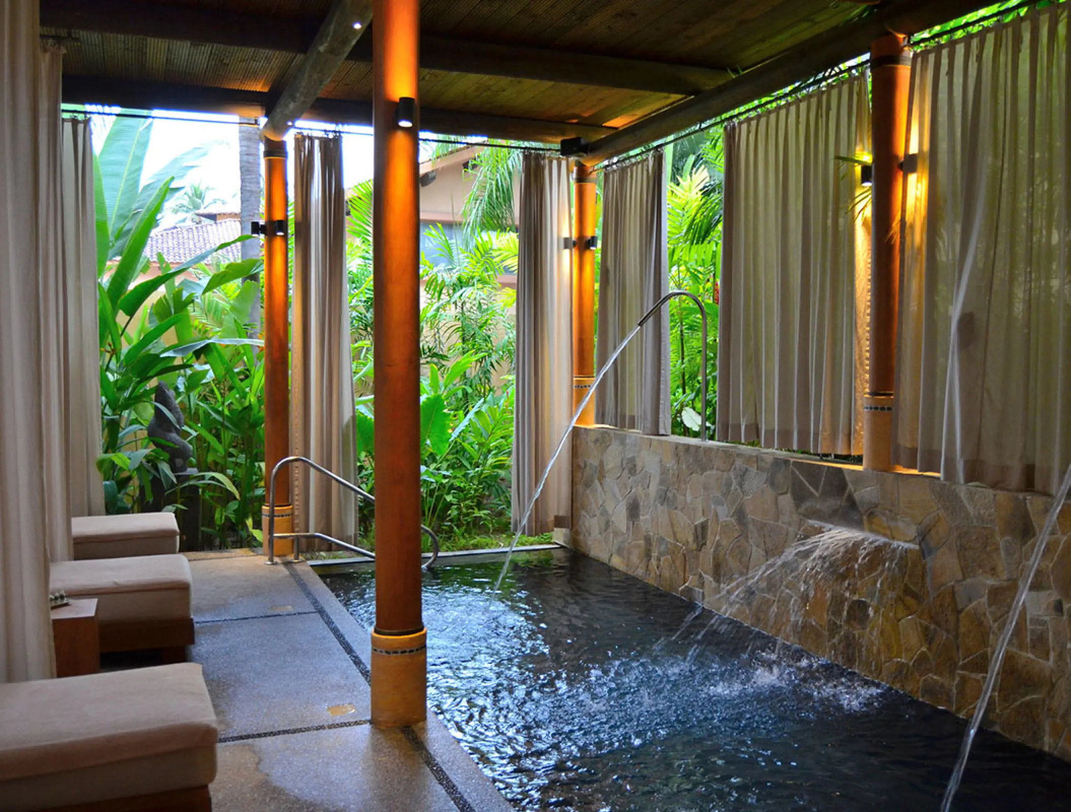 Hydrotherapy pool with water jets and stone walls at the Fiesta Americana Puerto Vallarta spa