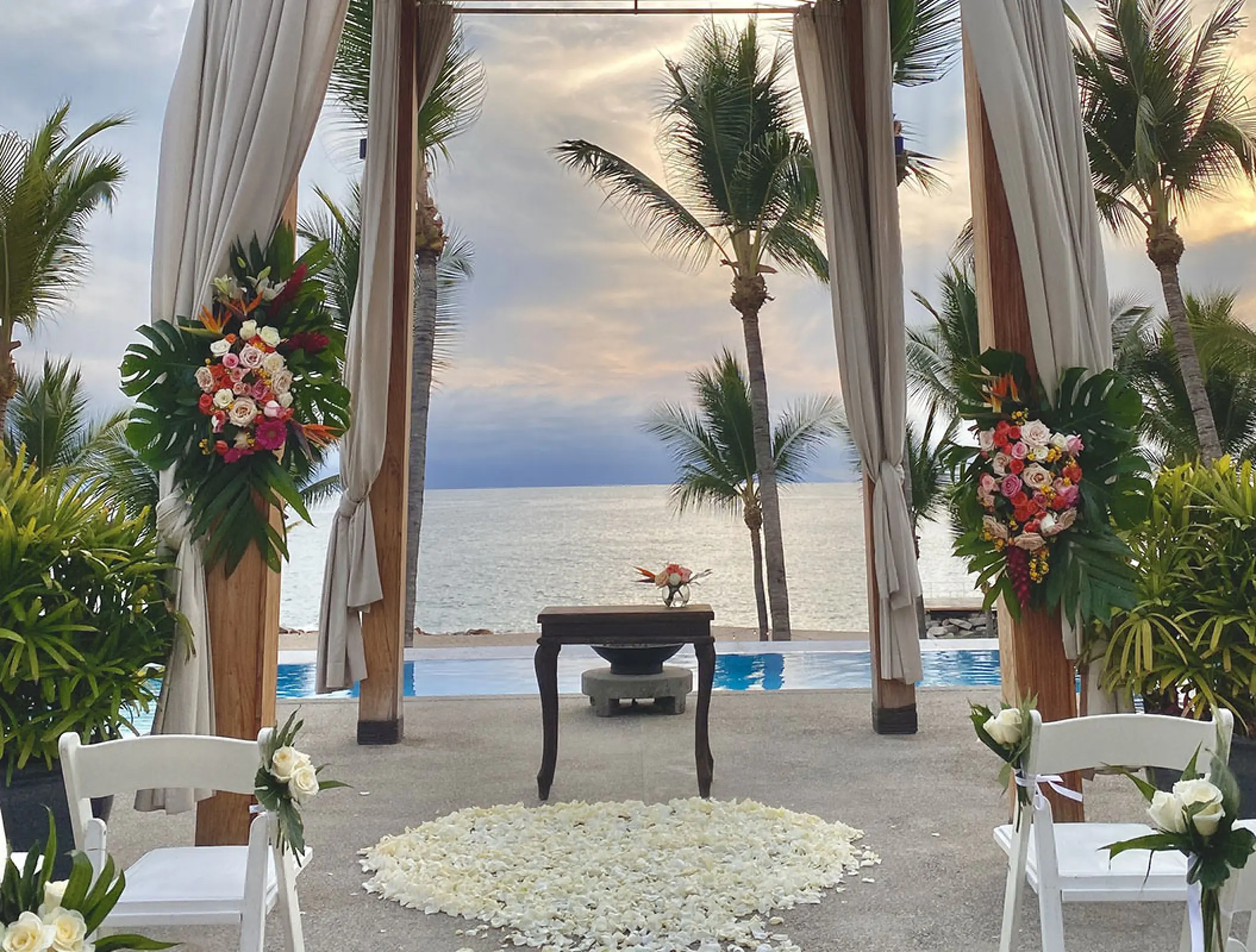 Oceanfront wedding ceremony setup at Fiesta Americana Puerto Vallarta
