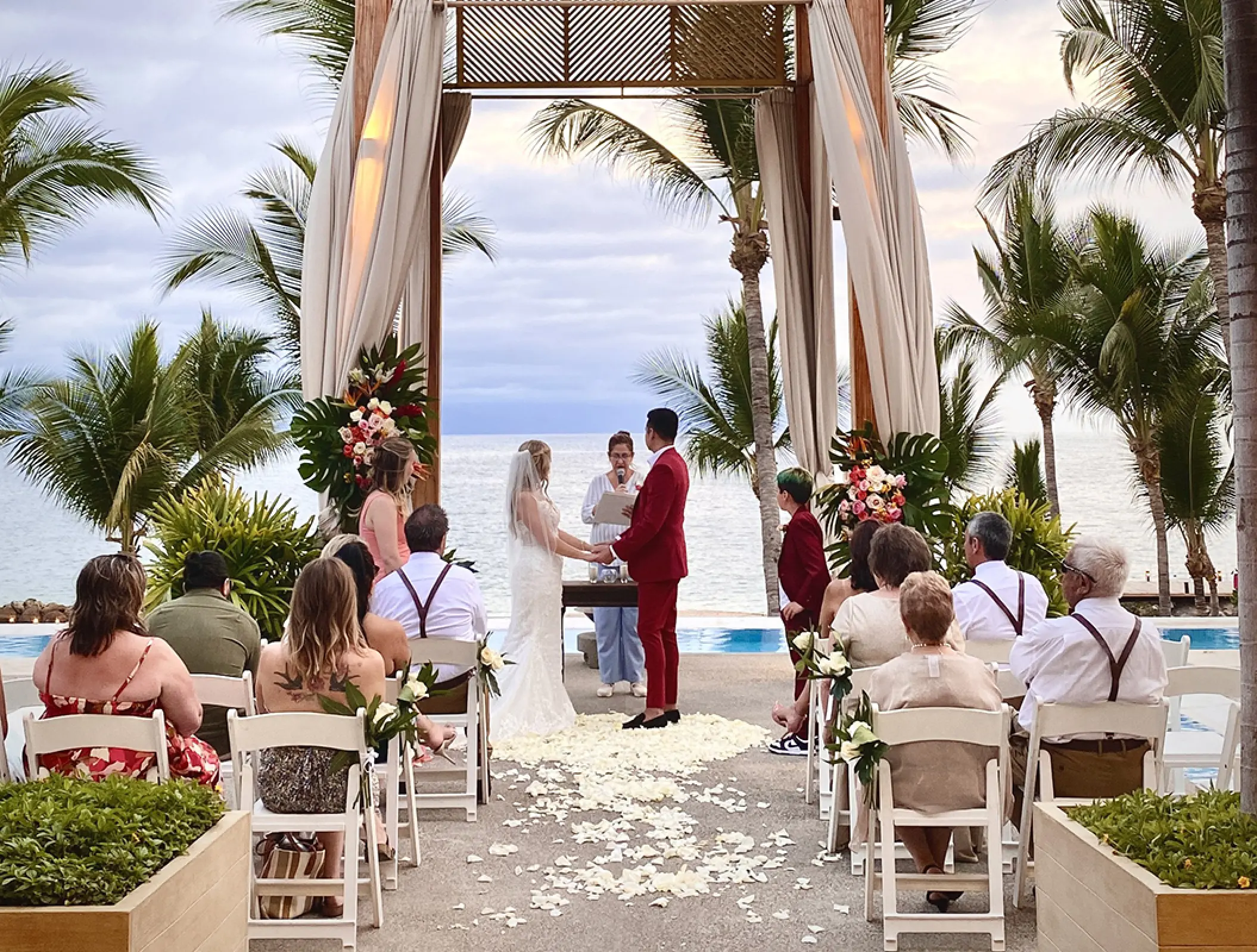 Wedding ceremony at Sonne Club terrace in Fiesta Americana Puerto Vallarta overlooking the ocean