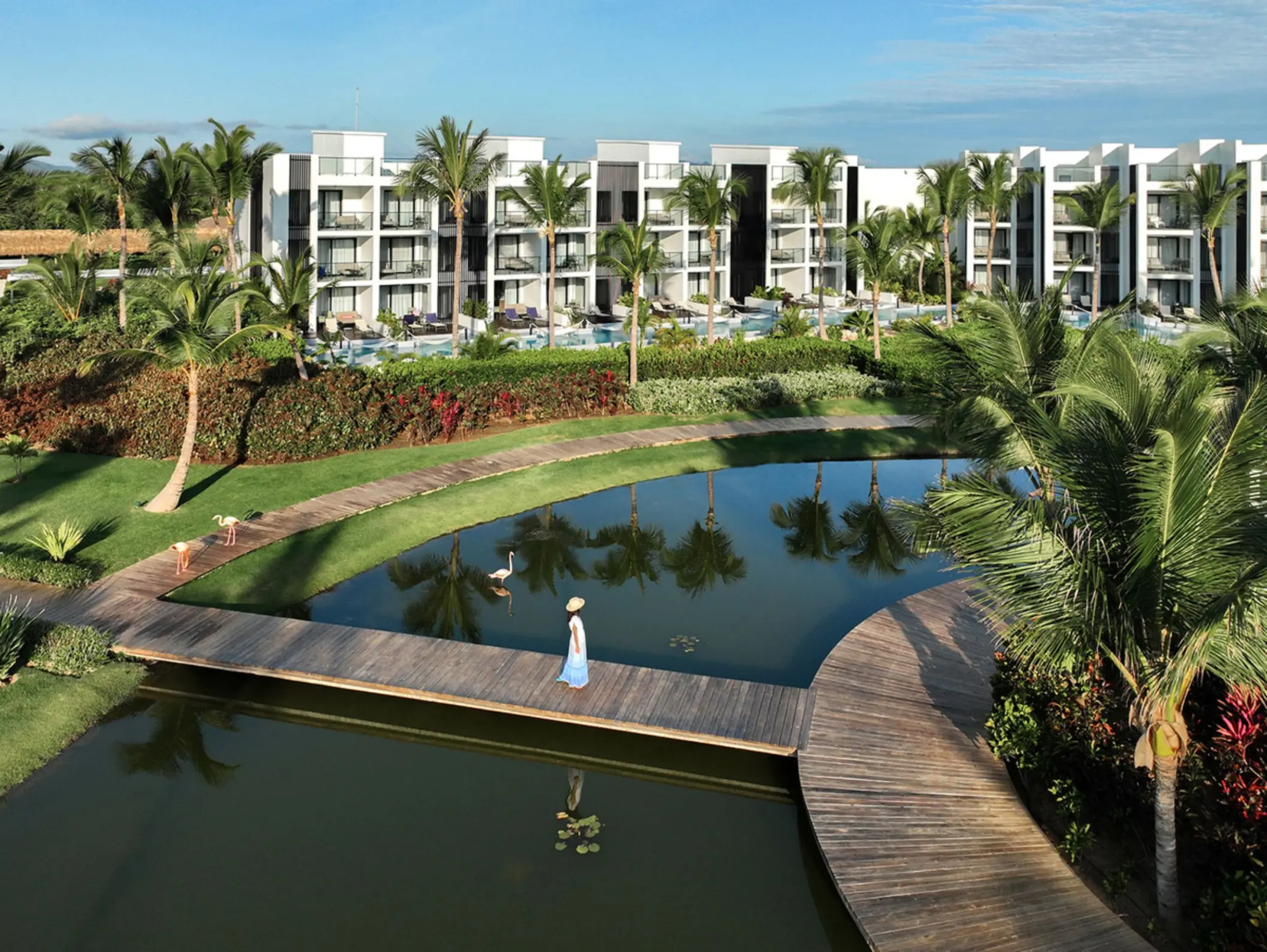Excellence Club garden lake and modern guest buildings at Finest Punta Cana, Punta Cana