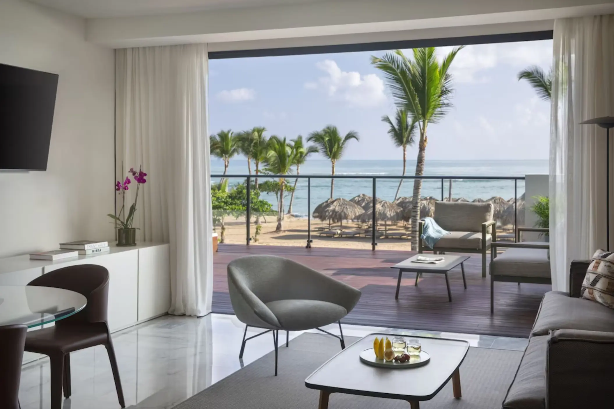 Modern living room in an ocean view suite at Finest Punta Cana, Punta Cana