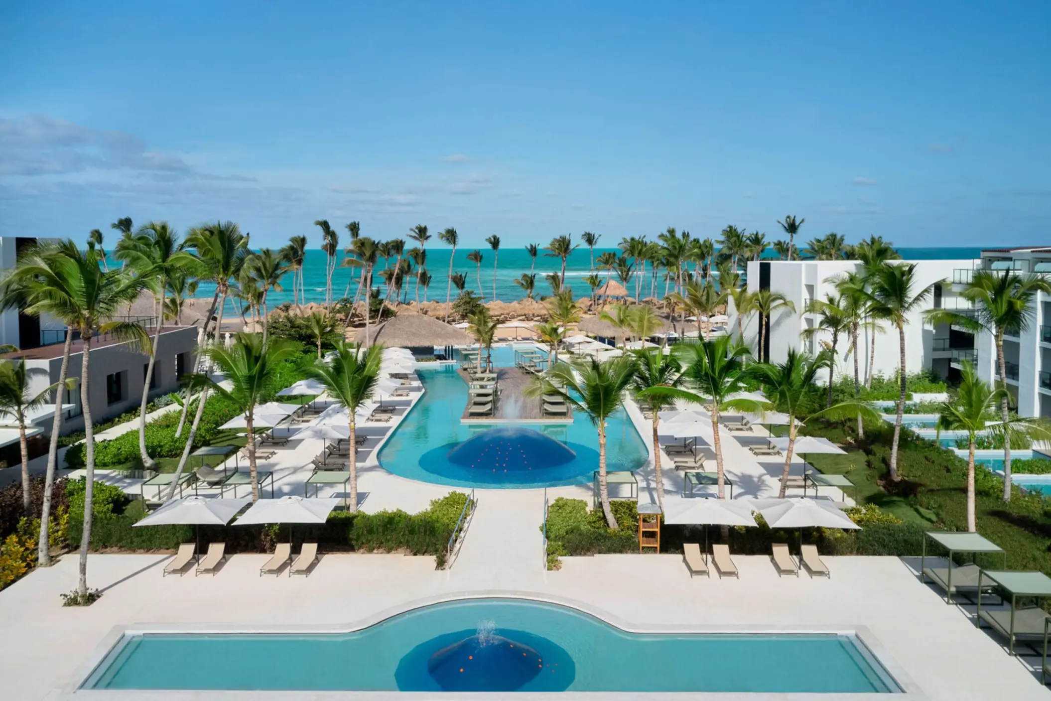 Main pool and guest accommodations at Finest Punta Cana, Punta Cana