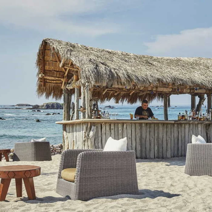 beach bar with bartender at four seasons resort punta mita