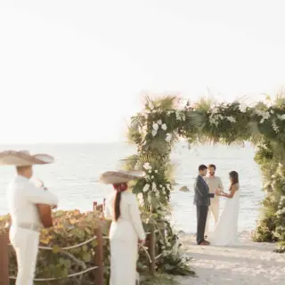 Beachfront wedding ceremony with a mariachi band at Four Seasons Punta Mita