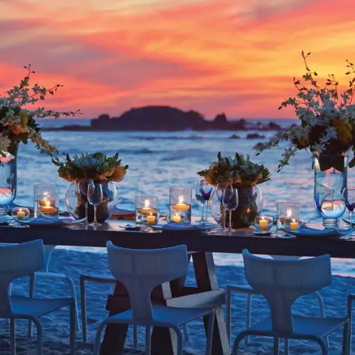 Beachfront wedding reception setup at sunset, Four Seasons Punta Mita