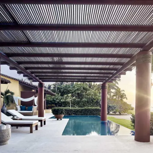 Private pool and terrace under a wooden pergola at sunset at Four Seasons Punta Mita