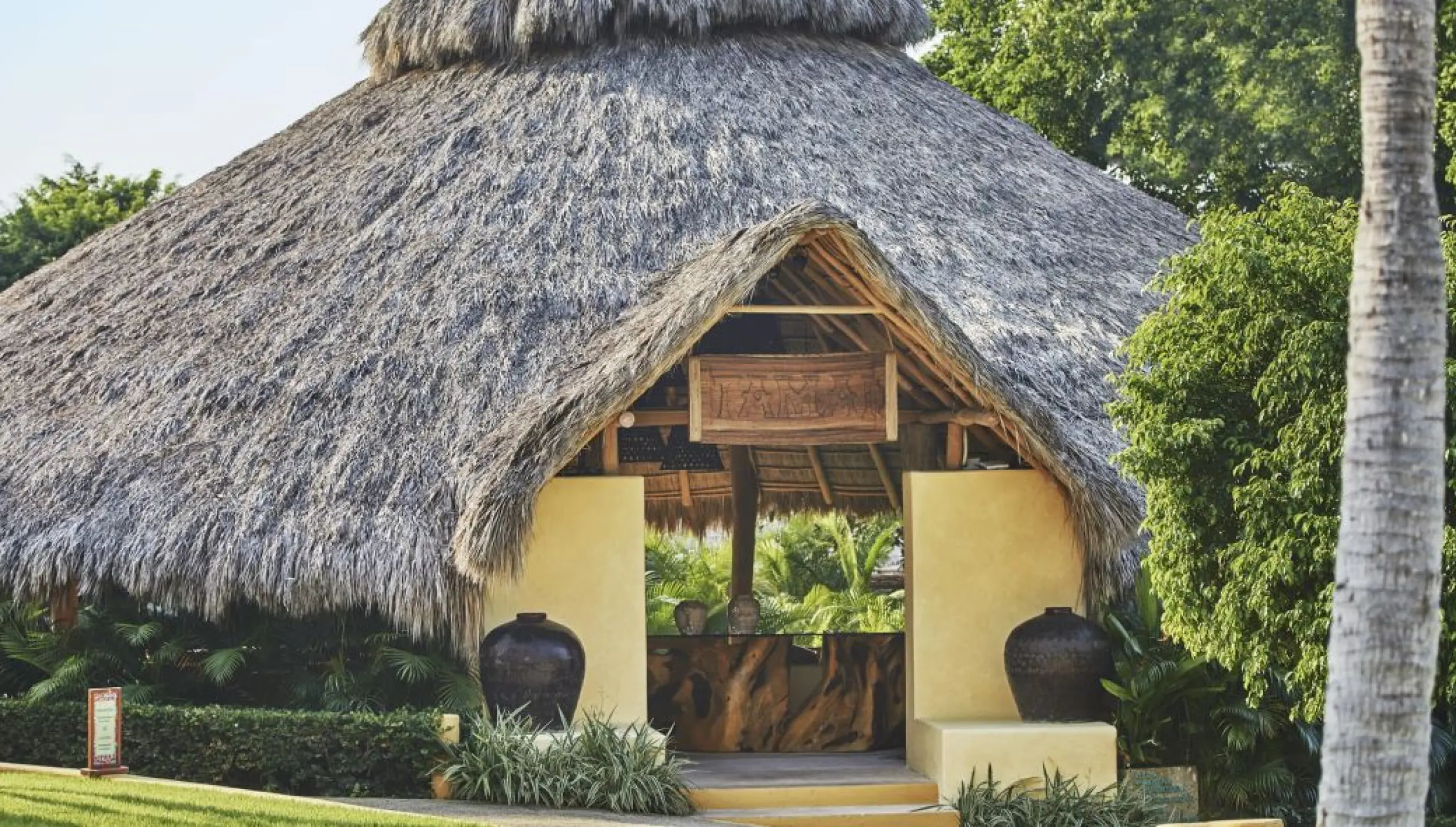 Thatched roof Tamai Garden wedding venue at Four Seasons Punta Mita