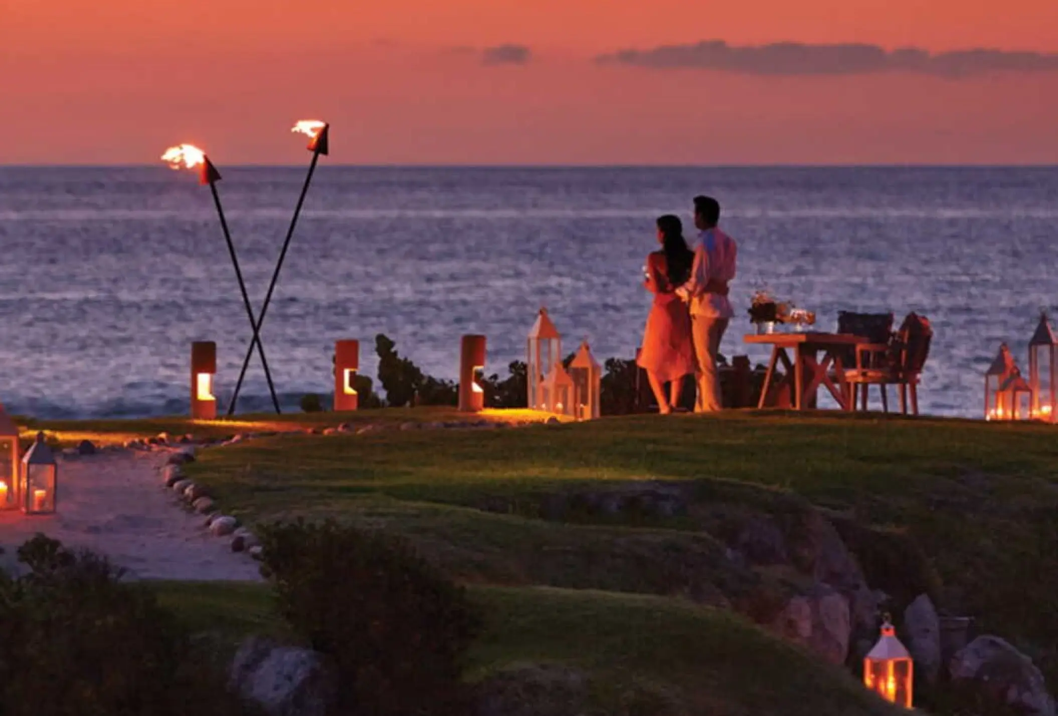 Private wedding dinner on a rocky cliff at Four Seasons Punta Mita, Punta Mita