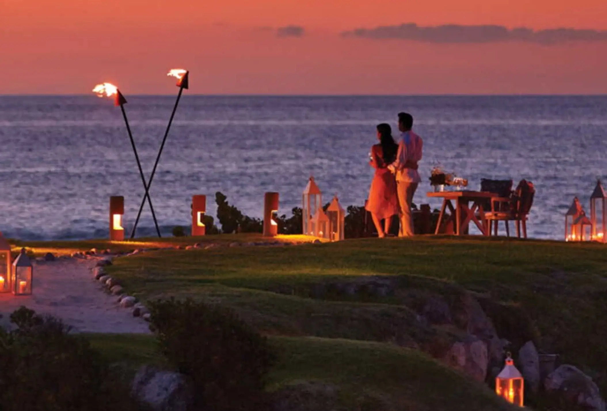 Private wedding dinner on a rocky cliff at Four Seasons Punta Mita, Punta Mita