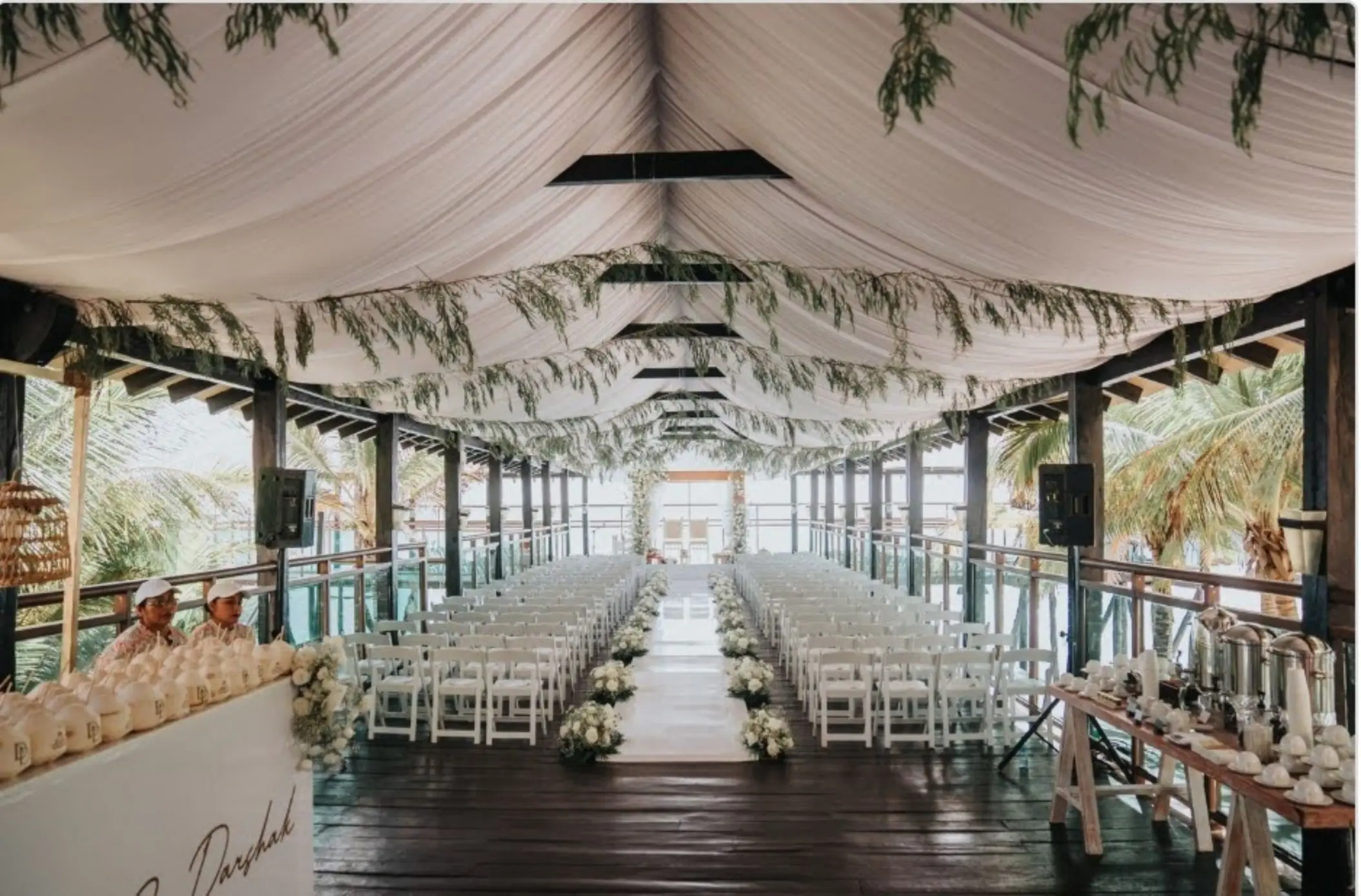 Pier deck wedding ceremony under a draped canopy at Generations Riviera Maya, Riviera Maya