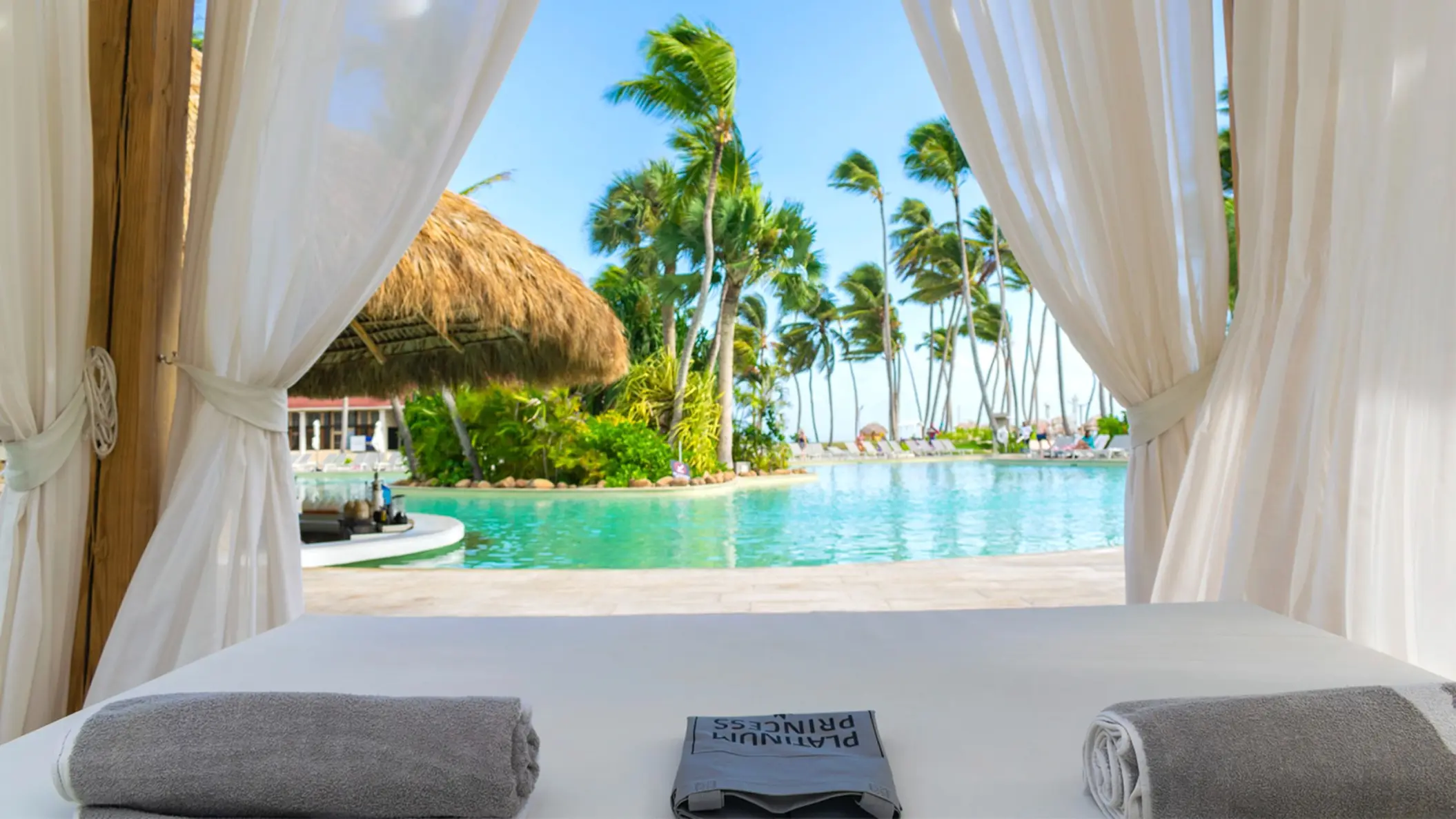 Balinese bed overlooking the tropical pool at Grand Bavaro Princess, Punta Cana