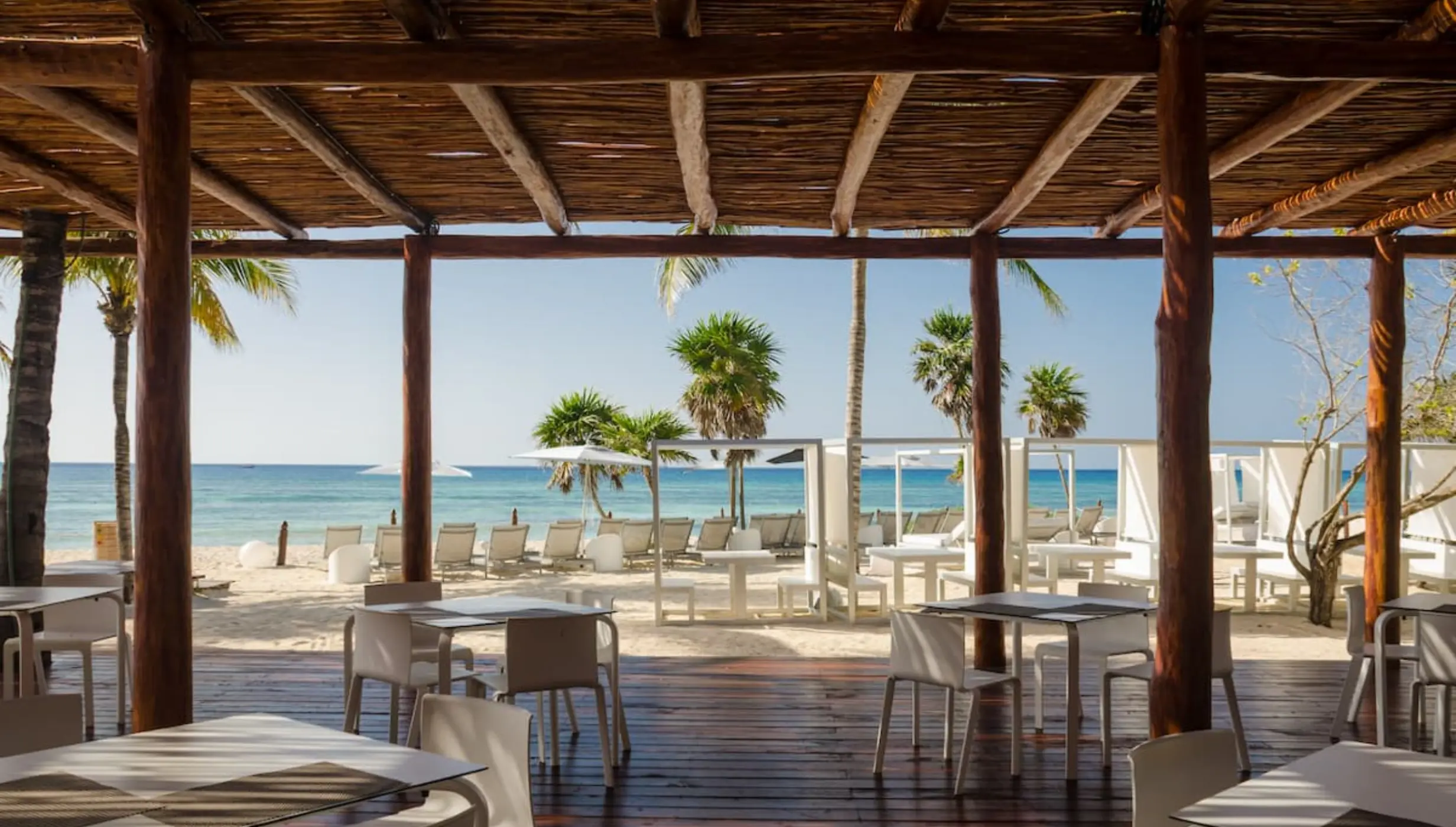 Shaded beachfront dining terrace with ocean views at Grand Bavaro Princess, Punta Cana