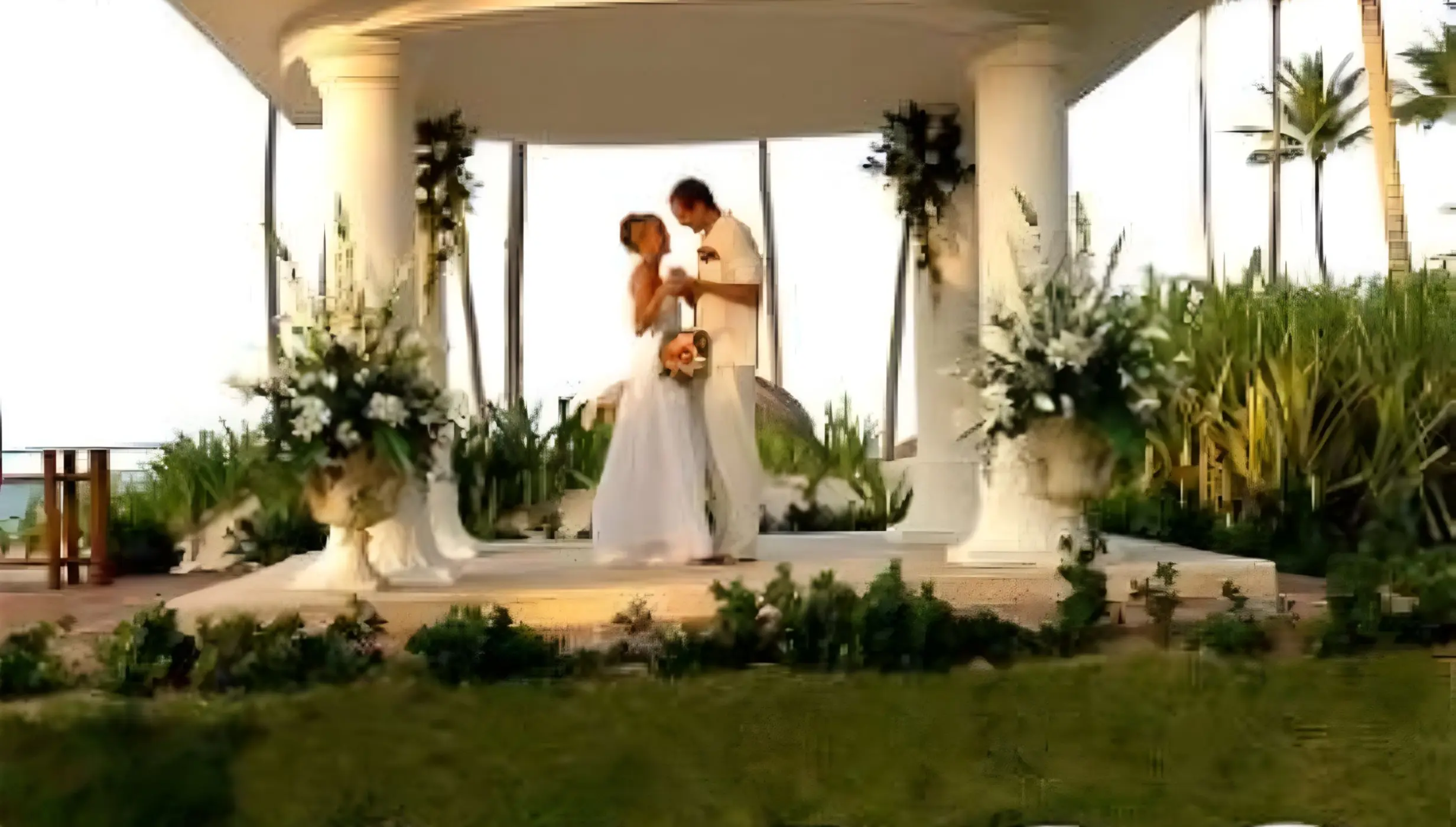 White domed gazebo wedding ceremony for a couple at Grand Bavaro Princess, Punta Cana