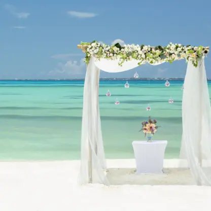 Beachfront wedding ceremony arch at Grand Fiesta Americana Coral Beach, Cancun