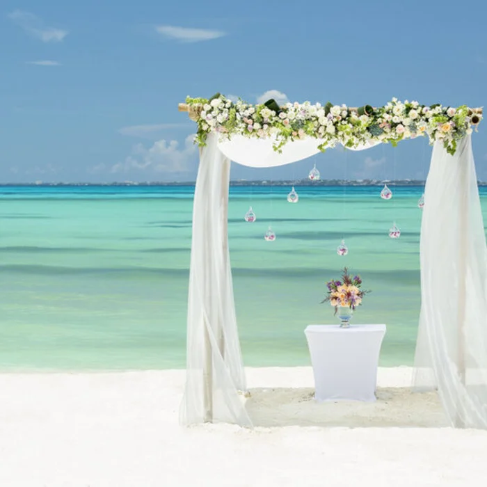 beach wedding setup at Grand Fiesta Americana Coral Beach Cancun