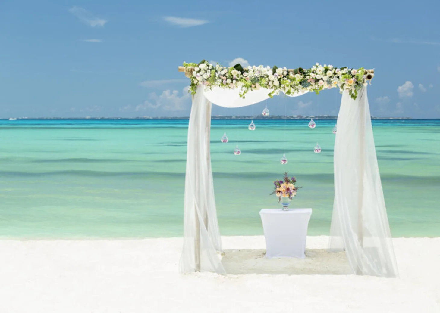 beach wedding setup at Grand Fiesta Americana Coral Beach Cancun