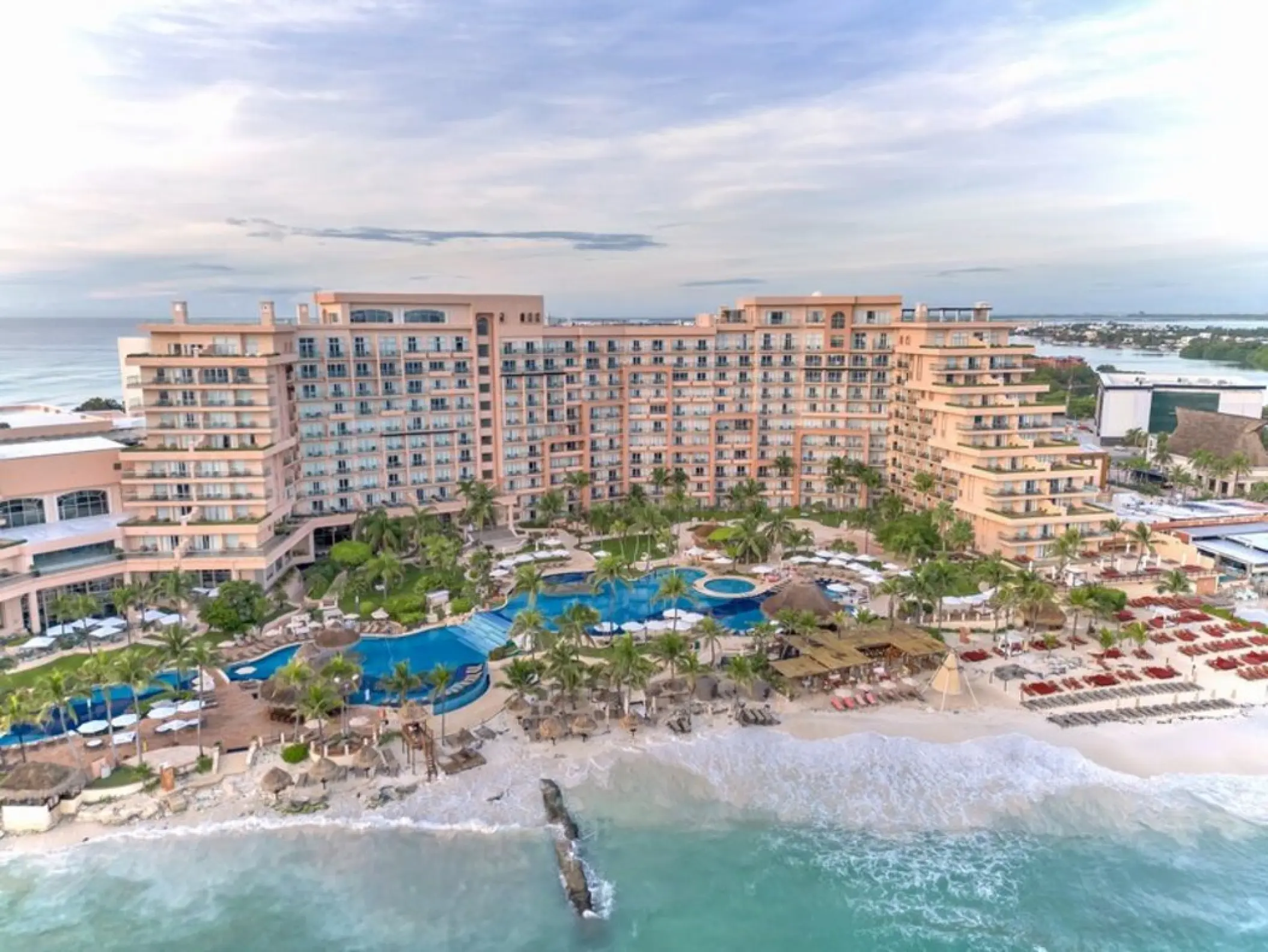 Aerial view of Grand Fiesta Americana Coral Beach resort pools and beachfront, Cancun