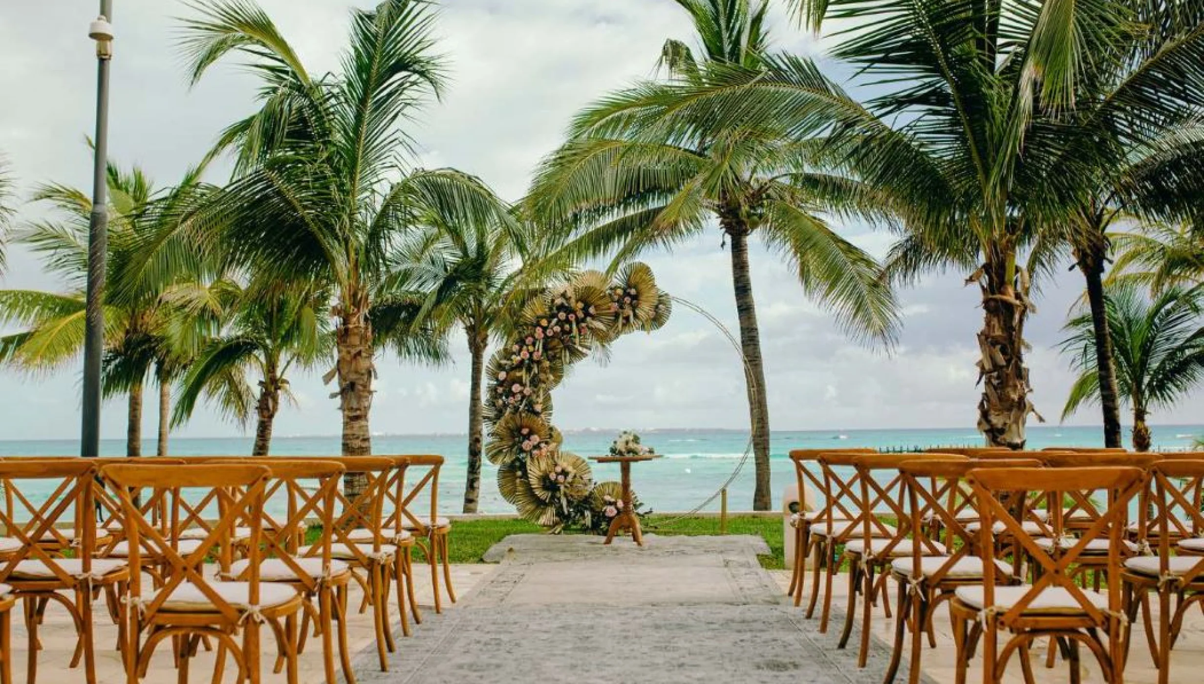 wedding setup at sunrise terrace venue at grand fiesta americana coral beach cancun