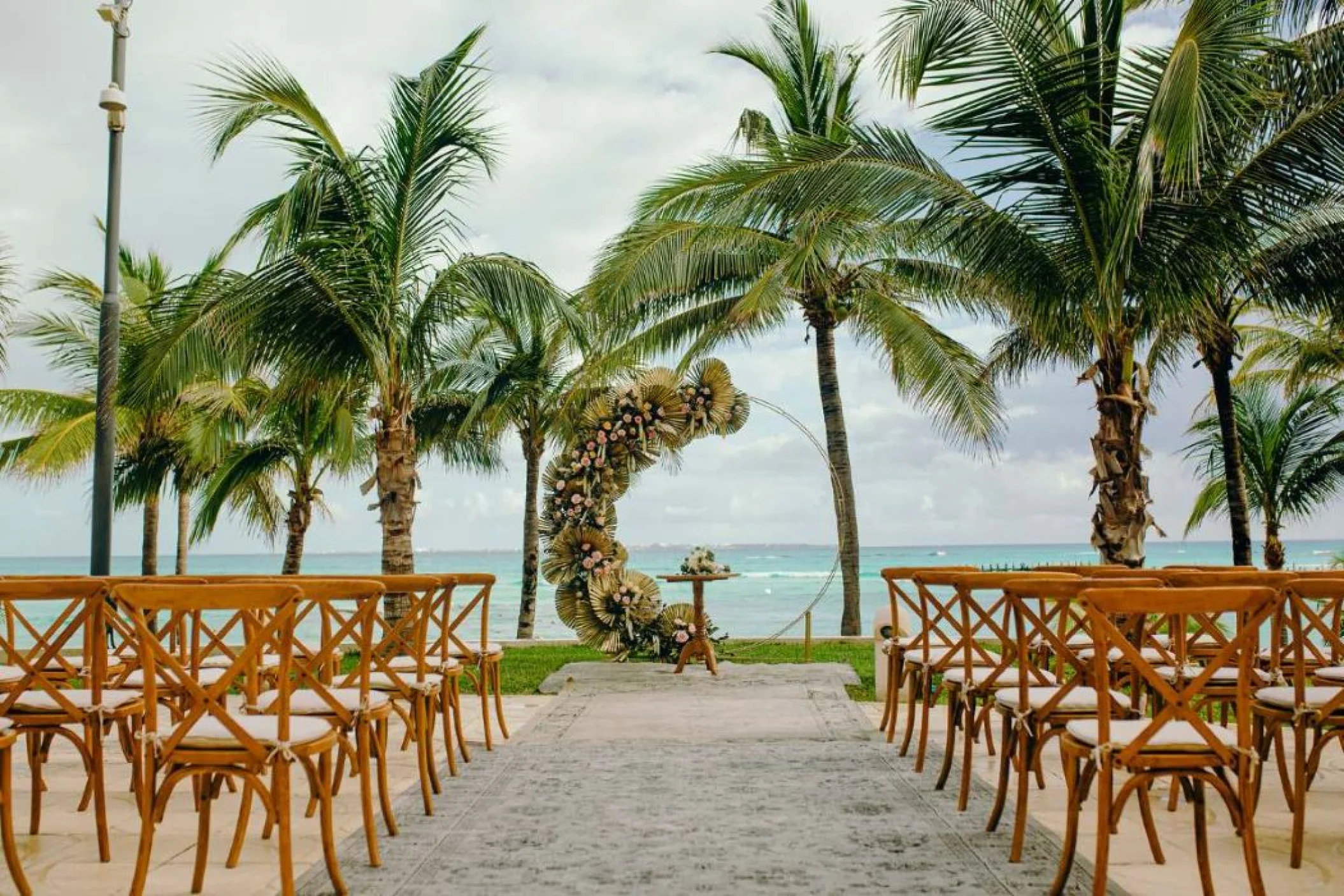 wedding setup at sunrise terrace venue at grand fiesta americana coral beach cancun