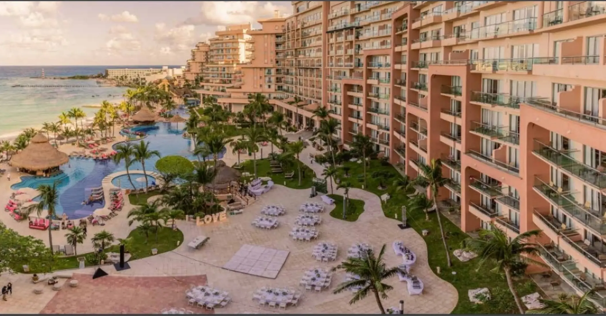 Aerial view of a terrace wedding reception at Grand Fiesta Americana Coral Beach, Cancun