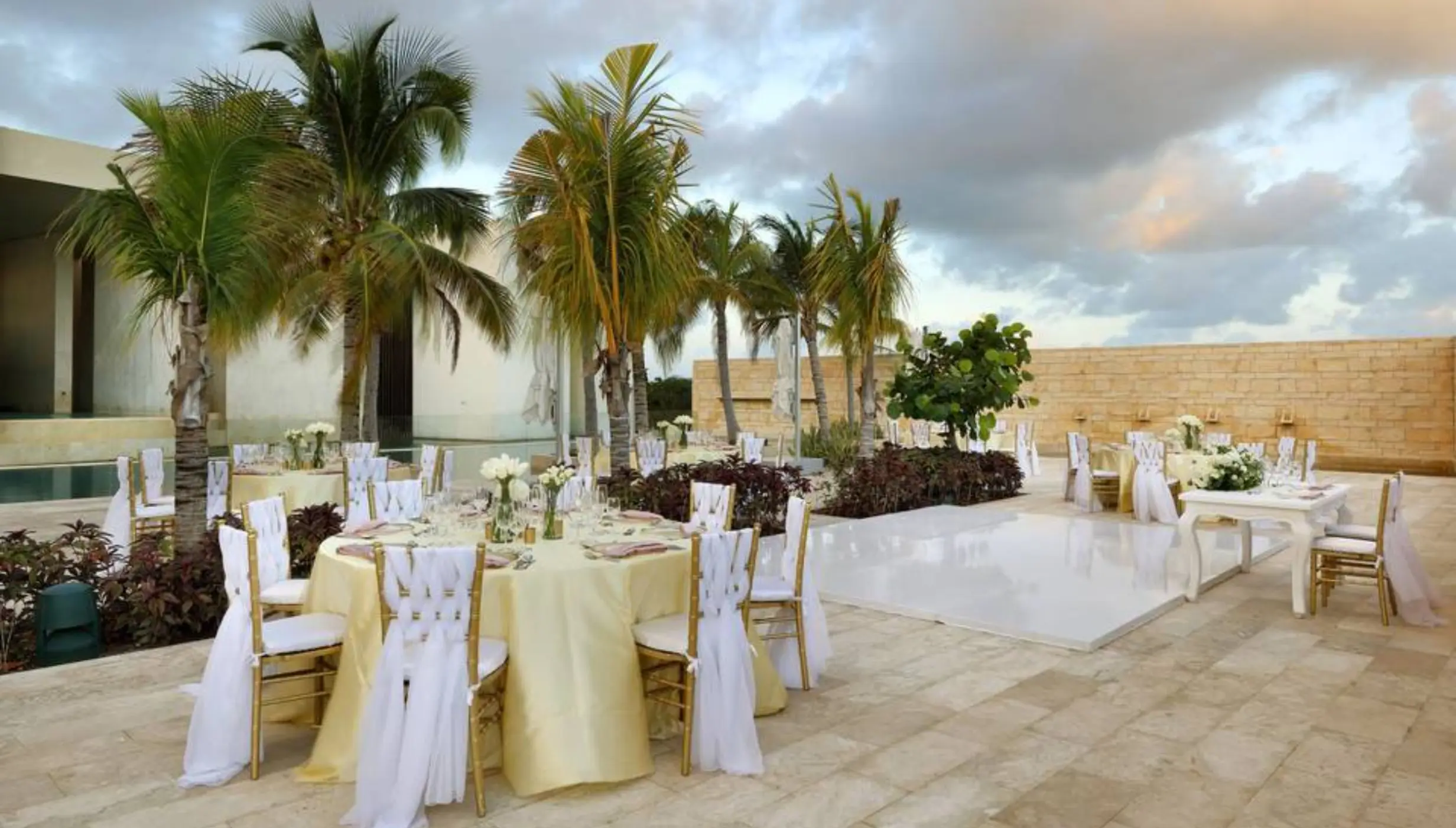 fizz pool terrace venue reception setup with dance floor at Grand Palladium Select Costa Mujeres