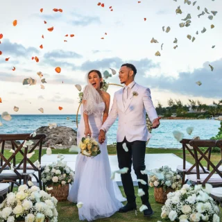 bride and groom at the bungalow lawn venue at grand palladium jamaica