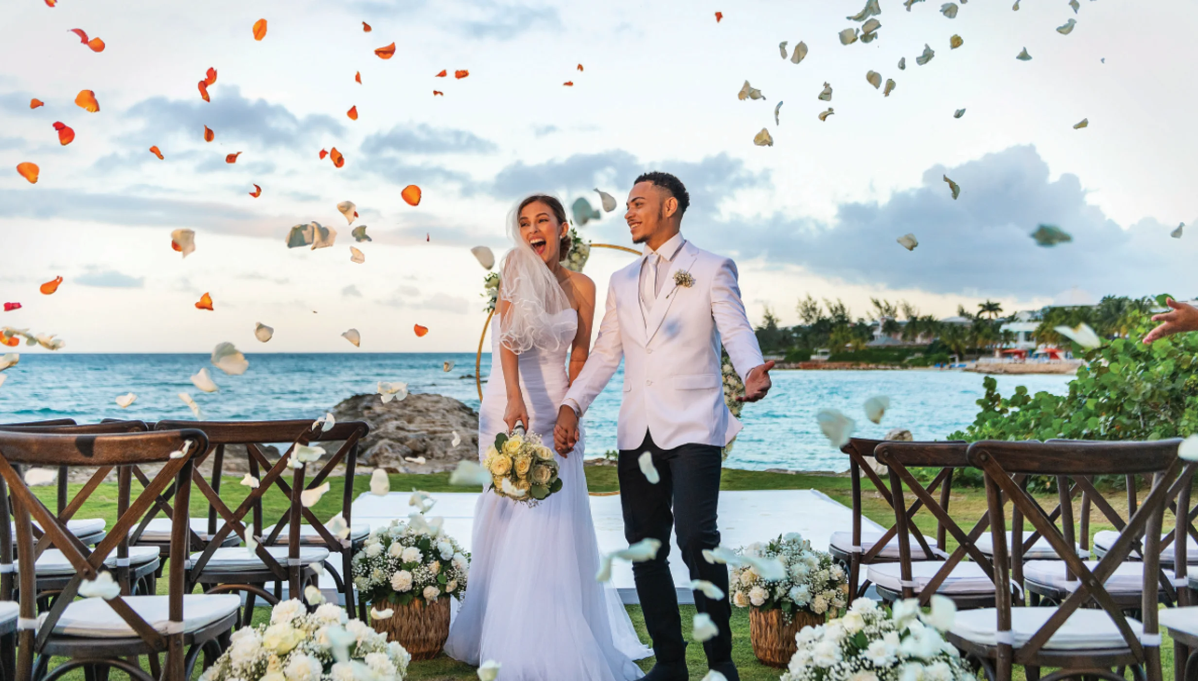bride and groom at the bungalow lawn venue at grand palladium jamaica