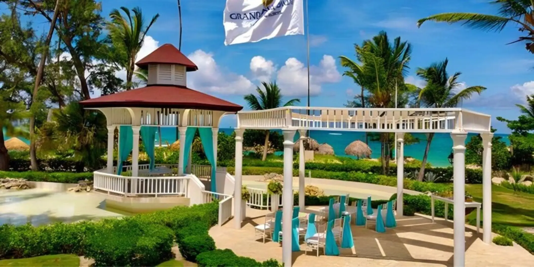 Sea view gazebo wedding ceremony venue with turquoise drapes at Grand Palladium, Punta Cana