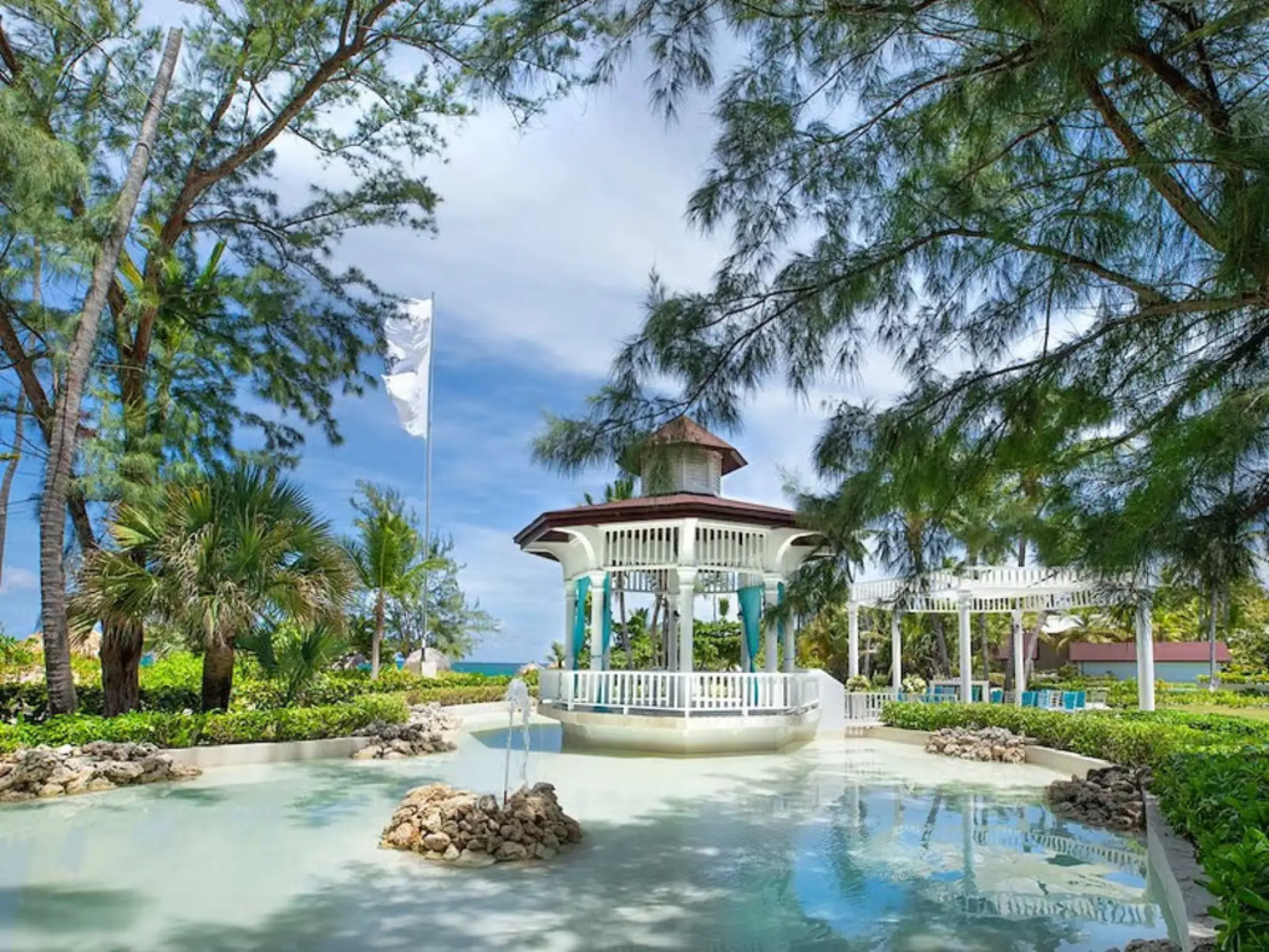 White gazebo wedding ceremony venue at Grand Palladium Punta Cana, Punta Cana