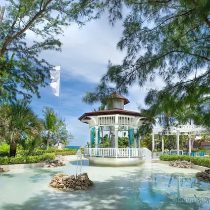 White gazebo wedding ceremony venue at Grand Palladium Punta Cana, Punta Cana