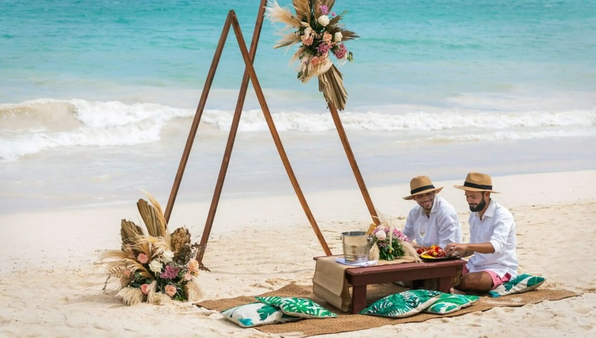 2 grooms on the beach venue at Grand Palladium Punta Cana